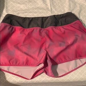 Pink athletic shorts with pocket
